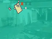 The free online puzzle game Kenney Land: Demolition showing a tower of debris and a camera, ready for a player to click and destroy the building materials