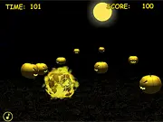 Screenshot of the online game Halloween Rush showing the player shooting at a large group of spooky, glowing jack-o'-lantern enemies