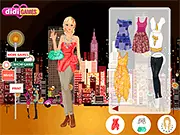Screenshot from City at Night Dress Up, showing a fashionable girl posing on a city street at night with neon signs and skyscrapers glowing in the background.