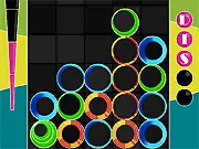 Disco Stack free online puzzle game screenshot showing colorful tokens stacked on a luminous disco dance floor.