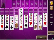 Gameplay screenshot of Black Widow Solitaire showing a large tableau of cards being stacked in descending order, with several columns near completion