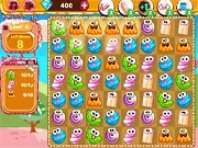 Gameplay screen of Candy Cafe, showing colorful candies being matched in the free online puzzle game