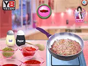 Screenshot of Ana Cooking Spaghetti game showing the character Ana in a kitchen preparing a plate of fresh spaghetti with sauce