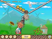 Zombie Launcher 2 game screenshot, free online physics puzzle game launching zombies from a cannon to hit smiley faces