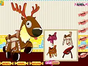 Happy Christmas Pals Cake online game screenshot, a decorated festive cake for Santa's reindeer friend, free Christmas baking game