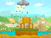 Screenshot of Cover Orange 2 free online physics puzzle game showing objects protecting a group of oranges