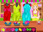 Ellie The Little Tailor: DIY Gown game screen showing Ellie standing next to a sewing machine with a partially finished, custom-designed gown | Play free fashion design game