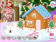Decorated gingerbread house online game screen featuring colorful gumdrops, icing, and candy canes