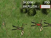 Screenshot of the Orc Slayer free online tower defense game, showing defensive towers firing at a horde of green orc enemies marching toward a village.