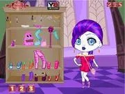 Baby Spectra Vondergeist dress up game screenshot, little Ghost Girl from Monster High in a cute pink and purple baby outfit, free online fashion game