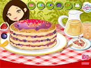 Close-up of a stacked pancake breakfast with berries, syrup, and whipped cream from the Pancake Patty game