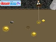 Ben 10 operating a mining claw rig in the Ben10 Gold Miner game, aiming for a large gold nugget underground