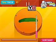 The Steak House free online cooking game screenshot, hand-cutting a piece of prime steak and serving it with vegetable sides, culinary simulation game