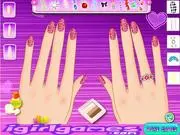 Fabulous Nail Art online design game, showing a hand with colorful nail polishes, cute patterns, and decorative rings.