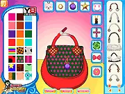 Custom Purse Designer free online game screen showing a personalized red and gold handbag with jewel accessories