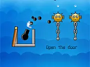 Free The Fish free online physics puzzle game shooting cannonballs to break chains and save fish