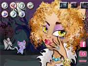 Clawdeen Wolf Manicure game screen showing the animated Monster High character Clawdeen Wolf with her hands ready for a stylish manicure