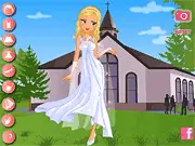 A beautiful bride in a wedding gown and veil with a thoughtful expression, from the Cold Feet Bride free online dress up game