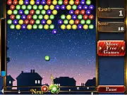 Star Bubbles game screenshot showing a cannon ready to shoot a colored bubble into a ceiling of multi-colored bubbles