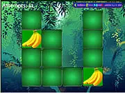 Screenshot of Fruit And Veg Pairs memory game showing a grid of face-down cards with a few turned-over pictures of fruits and vegetables