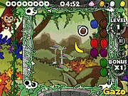 Play Cocomono free online on PlayArcadeHub, Match 3 puzzle game screenshot with colorful coconuts being lined up