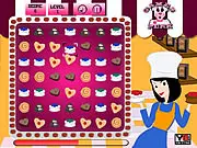Playing the free online puzzle game Collect Cookies, swapping colorful cakes and treats to make a match 3 line
