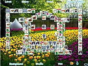 Screenshot of Dutch Mahjong Solitaire game board, showing classic mahjong tiles stacked in a layout, set against a Holland-themed background