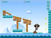 Gameplay screenshot of Iced Boom, showing a cute penguin on an icy platform near several explosive blocks and three yellow stars, illustrating the physics puzzle setup.