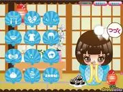 Screenshot of the free online game Kokeshi World showing a customizable Japanese Kokeshi doll wearing a traditional kimono and hairstyle.
