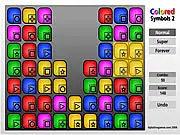 Play Colored Symbols 2 free online. Screenshot of the puzzle grid with colored bricks and black symbols.