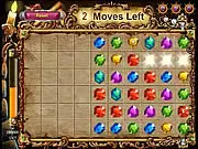 Screenshot of the Gem Invasion Match 3 game showing colorful gems on a grid being pushed towards a red laser beam at the bottom