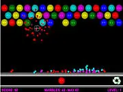 Marble Buster free online action puzzle game where the player shoots and breaks colorful marbles