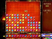 Jewels Wall free online match-3 puzzle game screenshot showing colorful gems and a rising wall of jewels