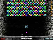 Play Treasure Shooter free online match 3 game, image showing a launcher aiming a jewel at a cluster of colored gems.
