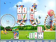Balloon Solitaire game screenshot showing a layout of playing cards on a colorful background, free online pair matching card game