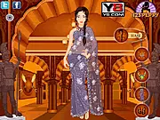 Global Girls Dress Up game screen showing dolls dressed in cultural clothing inspired by countries like India and China, play free online fashion game