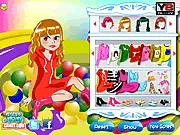 Screenshot of Julie Loves Ball Pit dress-up game showing little Julie ready for the park and ball pit, available to play free online