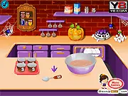 Spooky Halloween Cupcakes free online cooking game showing decorated, chocolaty cupcakes with spooky holiday icing and decorations