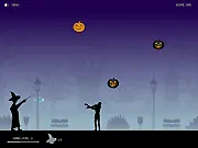 Zompkins game screen showing a magic wand smashing orange pumpkins and zombies falling from the sky