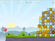Screenshot of Cube Attack free online puzzle game with colorful cubes and TNT blocks near a cliff edge