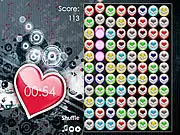 Valentine Hearts Game screen showing a grid of different colored heart icons being matched in groups of three or more - Free online match-3 puzzle.