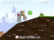 Angry Birds Bike Revenge game screenshot showing Red the Angry Bird riding a dirt bike over a gap, attempting to avoid a green pig enemy.