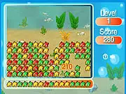 Fish Bricks free online puzzle game, matching same-colored groups of fish with bomb power-ups on PlayArcadeHub