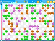 Screenshot of Peas Never Play Out puzzle game with colorful peas on the screen and an aiming cursor