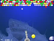 Atlantic Balls game screenshot showing colored spheres rising from the bottom of the screen in an underwater Atlantis setting, free online bubble shooter game