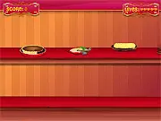 Thanksgiving Dinner Panic free online game screenshot showing Lilly, Ella, and Sarah frantically cooking in a busy kitchen with a turkey and various dishes