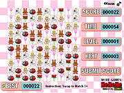 Screenshot of the Valentine Tri Match free online game showing various heart, rose, and chocolate tiles being matched on a puzzle grid.