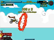 Screenshot of Risky Rider 6 online game showing a motorbike rider performing a flip over a large jump
