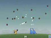 Screenshot of Dinosaurs and Meteors free online game showing a Tyrannosaurus Rex defending against multiple incoming meteors.