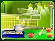 Screenshot of Potato Tomato Rosemary Soup game showing virtual kitchen counters with bowls of chopped potatoes, tomatoes, and fresh rosemary ready to be added to a cooking pot. Play the cooking game online.